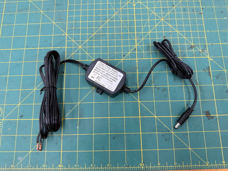 Power Supply in 110-240V Out12Vdc 0.5A 6VA Model NO: MHPO-120050 [Used]