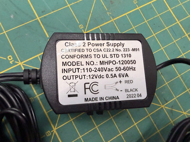 Power Supply in 110-240V Out12Vdc 0.5A 6VA Model NO: MHPO-120050 [Used]